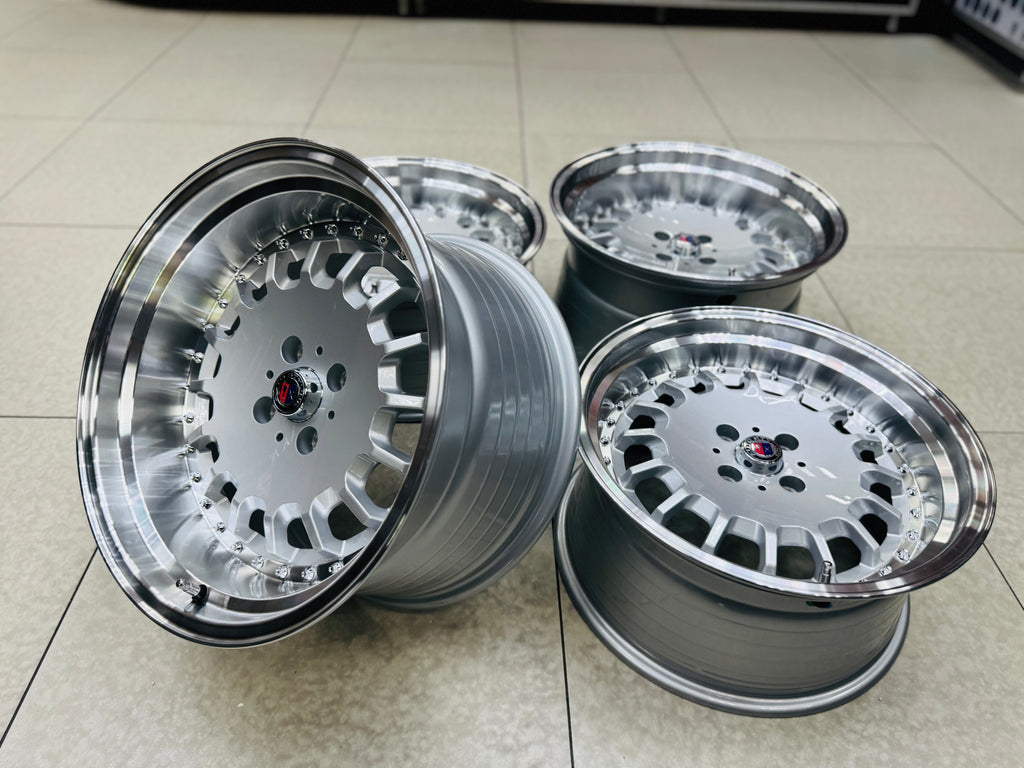 17” AS- E30 BOTTLE CAPS   8.5/10j 4/100  SILVER