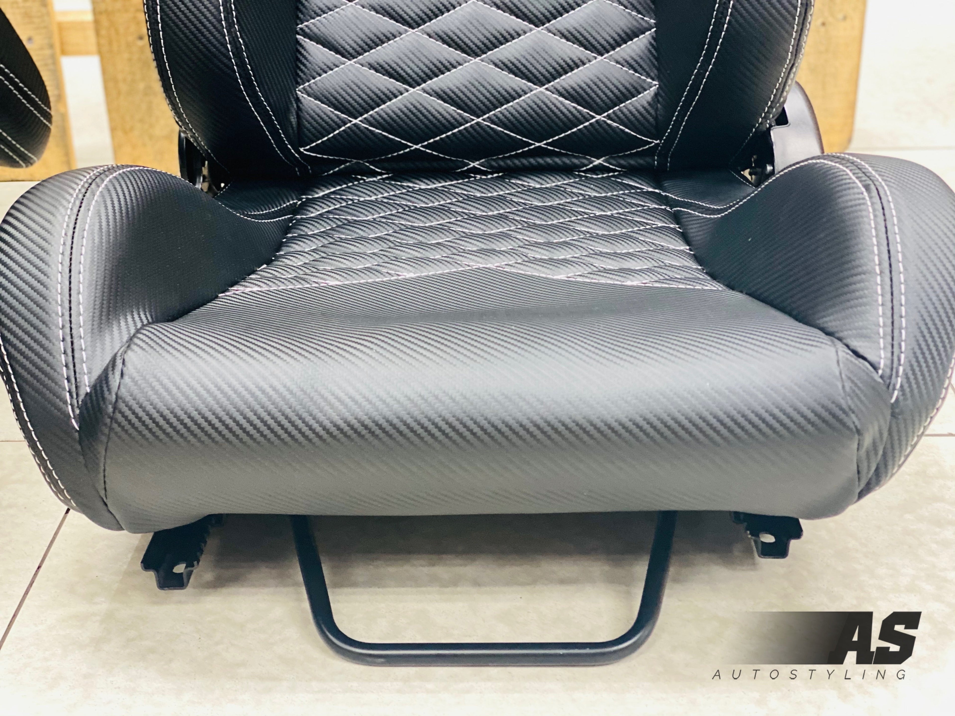 AS WINGBACK SEATS (D) CARBON LOOK