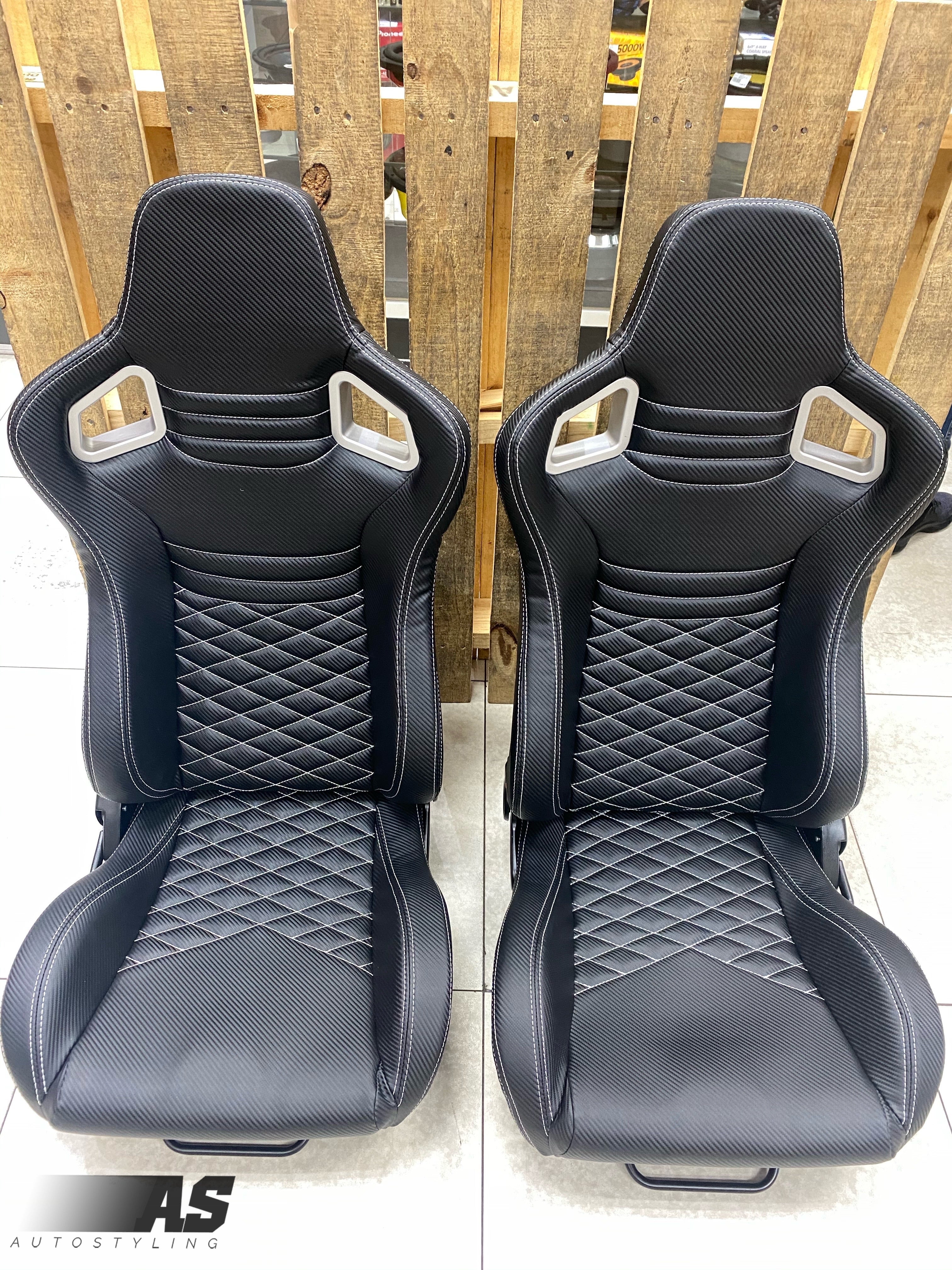 AS WINGBACK SEATS (D) CARBON LOOK