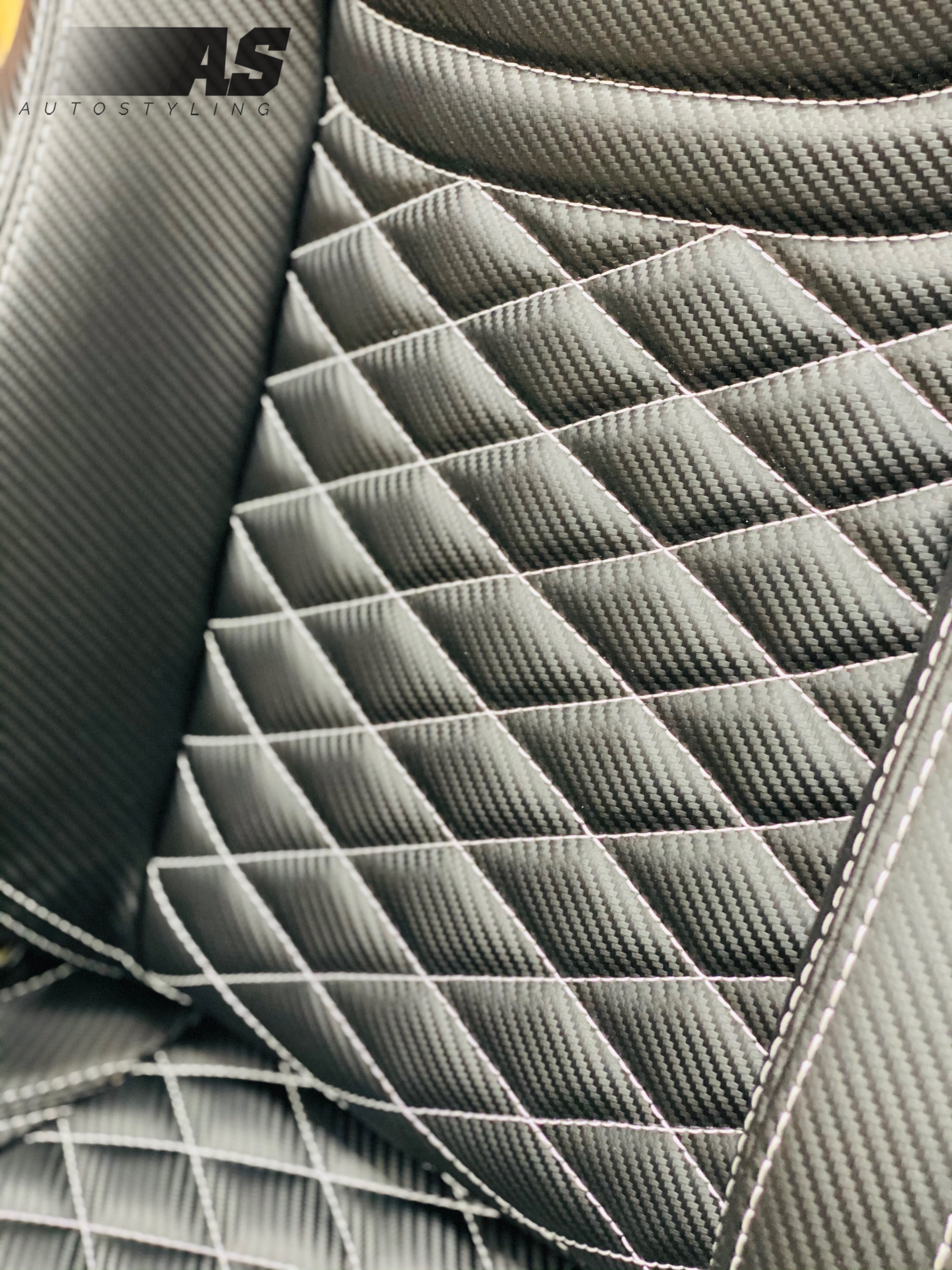 AS WINGBACK SEATS (D) CARBON LOOK